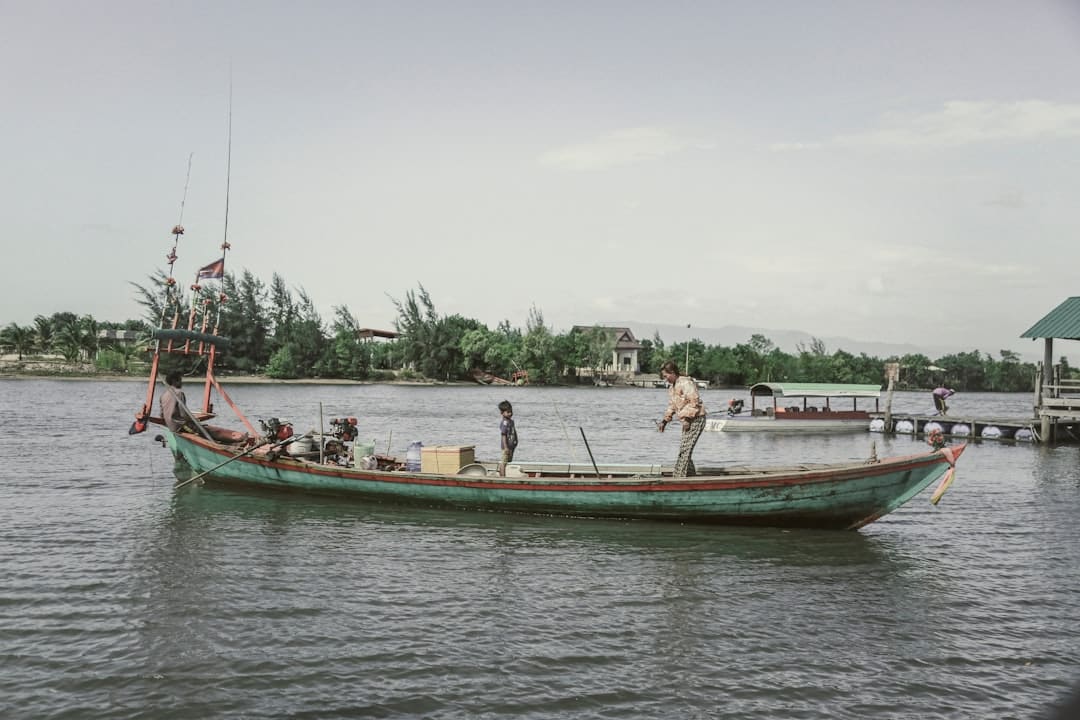 A fishing charter boat on the open water of the Gulf.