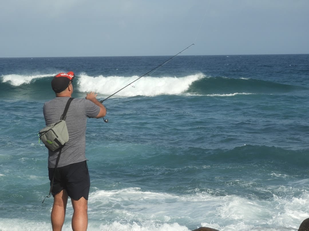 An angler with a large tuna catch.