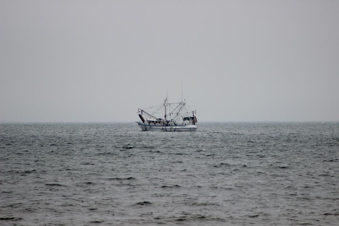 Modern, high-performance offshore fishing boat on the water.