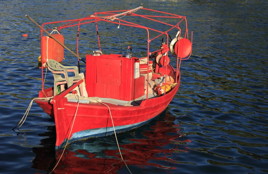 Offshore fishing boat speeding through the water.